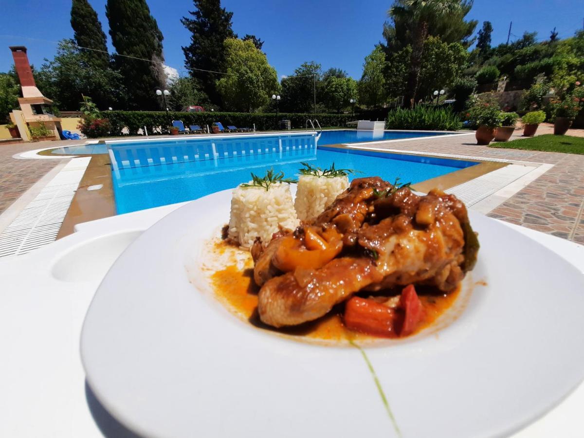 Nikos Apartments อาร์ริลลาส ภายนอก รูปภาพ
